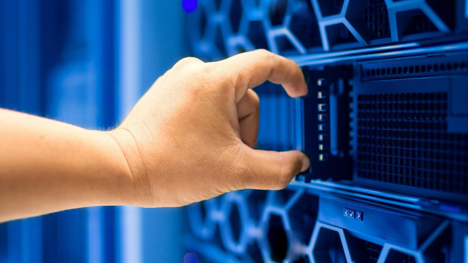 data centre technician working on servers